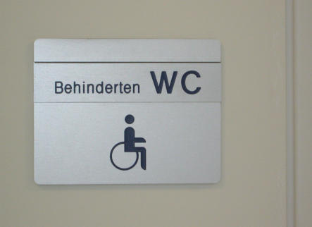 Türschild mit Texteinschub und fest graviertem Piktogramm